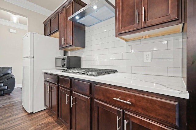 1630 Eaglerock Dr, Suwanee, GA 30024 - kitchen with wall chimney exhaust hood, appliances with stainless steel finishes, ornamental molding, dark wood-style floors, and decorative backsplash
