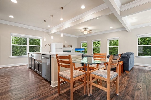 1630 Eaglerock Dr, Suwanee, GA 30024 - dining room with healthy amount of natural light, dark wood finished floors, beamed ceiling, ceiling fan, and crown molding