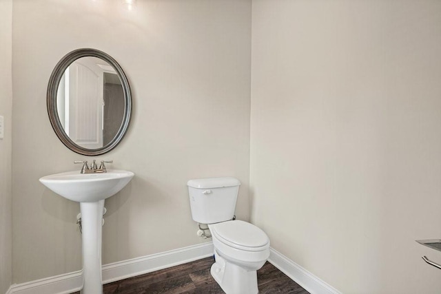 1630 Eaglerock Dr, Suwanee, GA 30024 - bathroom featuring wood finished floors and baseboards