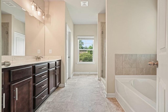 1630 Eaglerock Dr, Suwanee, GA 30024 - bathroom with vanity, a garden tub, and a shower stall