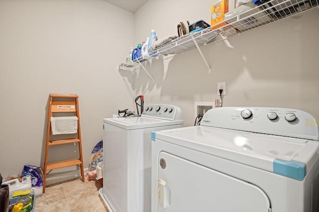 1630 Eaglerock Dr, Suwanee, GA 30024 - laundry room featuring washer and dryer and baseboards