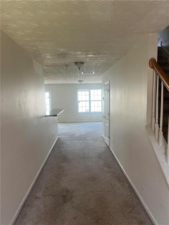 730 Georgetown Ln, Jonesboro, GA 30236 - corridor featuring carpet, a textured ceiling, and stairway