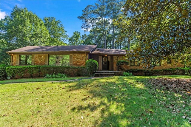 ranch-style home with a front yard