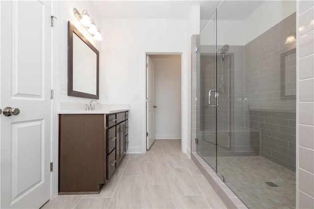 707 Dodd Ln N Unit 164, Buford, GA 30518 - bathroom with a shower stall, vanity, and baseboards