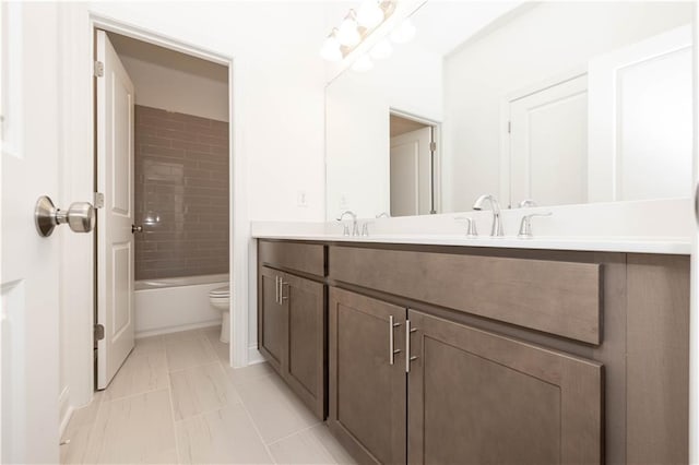 707 Dodd Ln N Unit 164, Buford, GA 30518 - full bathroom with toilet, double vanity, and  shower combination