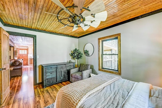 81 Falcon Cir, Ellijay, GA 30540 - bedroom with wooden ceiling, wood finished floors, ceiling fan, and ornamental molding