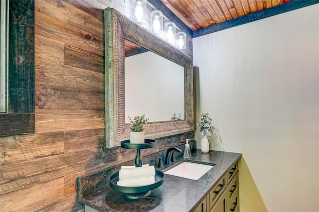 81 Falcon Cir, Ellijay, GA 30540 - bathroom featuring wooden walls, double vanity, and wooden ceiling