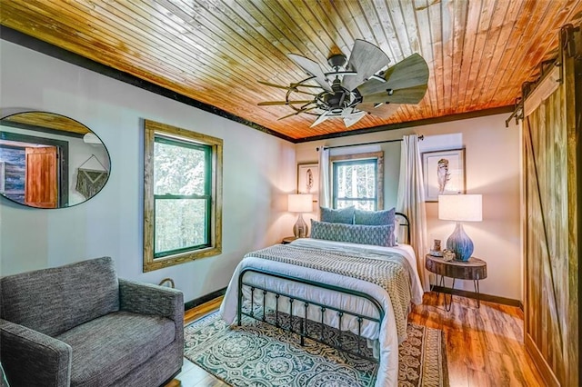 81 Falcon Cir, Ellijay, GA 30540 - bedroom with wood ceiling, wood-type flooring, a ceiling fan, and crown molding