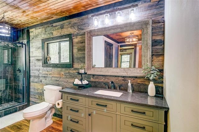 81 Falcon Cir, Ellijay, GA 30540 - bathroom featuring vanity, a stall shower, wood ceiling, wood finished floors, and wooden walls
