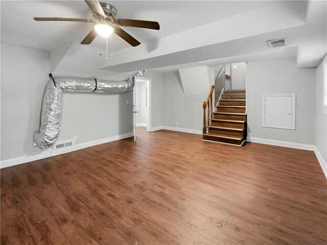 unfurnished living room with hardwood / wood-style floors and ceiling fan