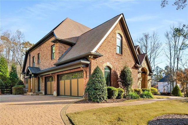 view of property exterior with a garage