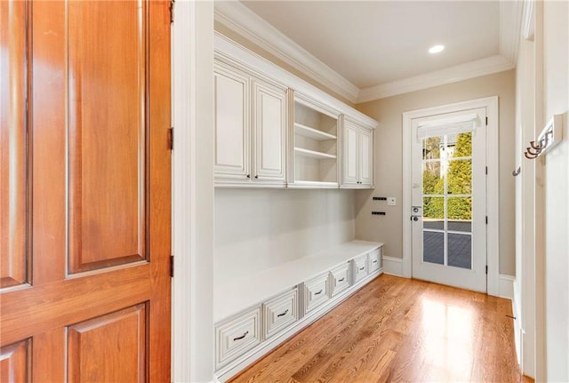 mudroom with light hardwood / wood-style floors and ornamental molding