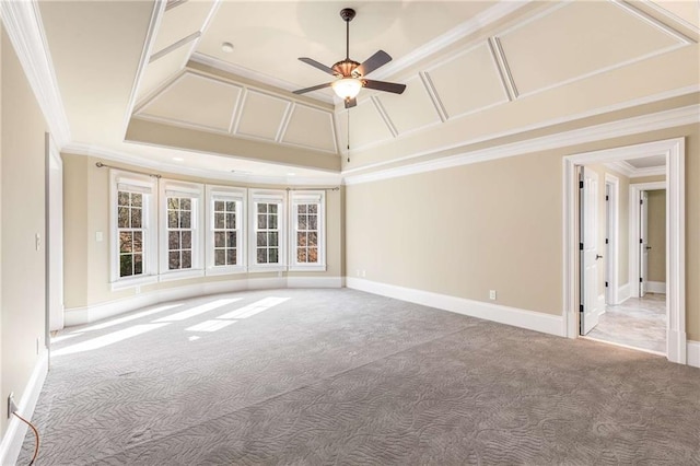 unfurnished living room featuring carpet, ceiling fan, and ornamental molding