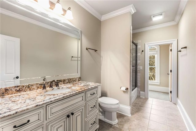 bathroom with vanity, toilet, crown molding, and walk in shower