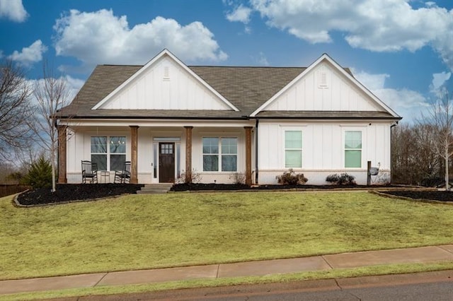 view of front facade with a porch and a front yard