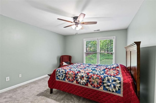 2709 Windrush Dr, Buford, GA 30518 - bedroom featuring carpet floors, baseboards, and a ceiling fan