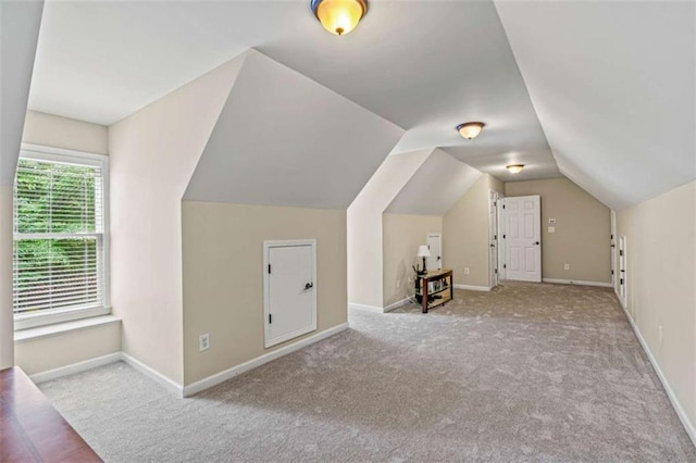 2709 Windrush Dr, Buford, GA 30518 - additional living space featuring carpet floors, lofted ceiling, and baseboards