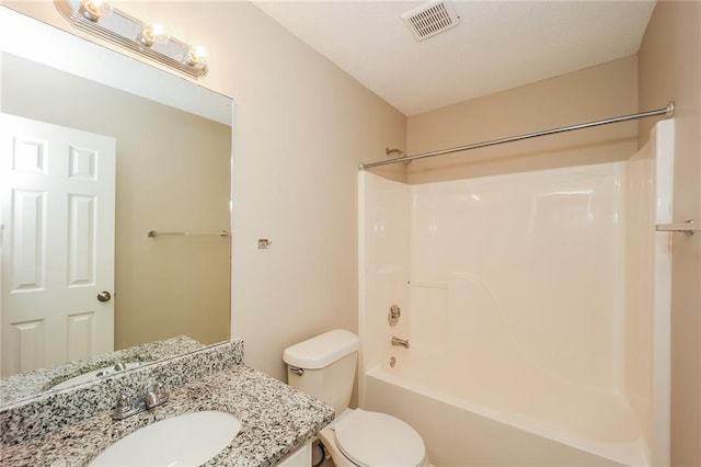 full bathroom with vanity, toilet, and shower / bath combination