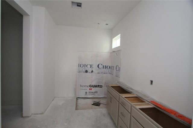 bathroom featuring concrete floors