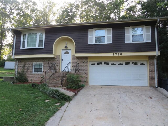 split foyer home featuring a garage