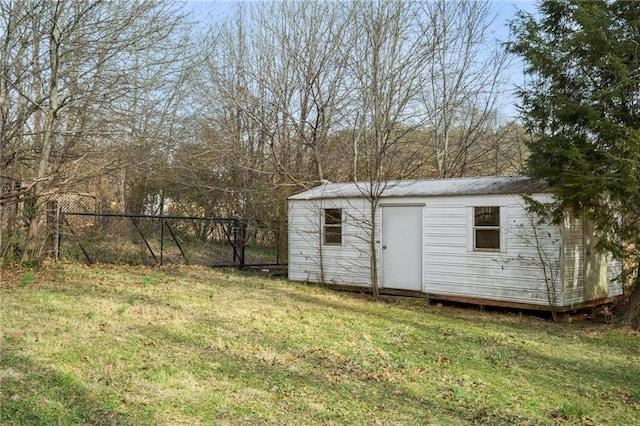 view of outdoor structure with a lawn