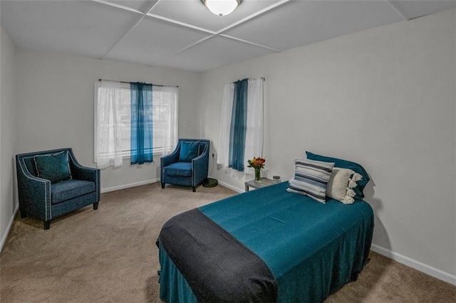 bedroom with carpet and coffered ceiling