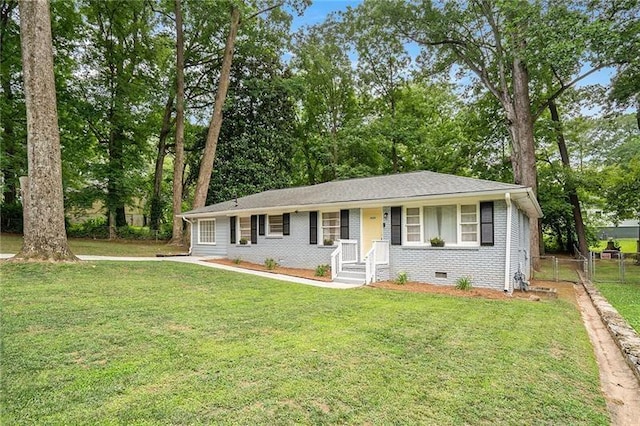 single story home featuring a front yard