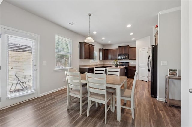 81 Birch River Pointe, Dallas, GA 30132 - dining room featuring dark wood-type flooring, baseboards, and recessed lighting
