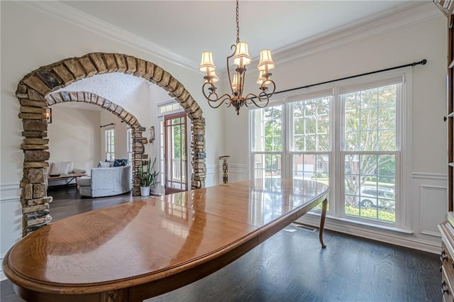 113 Gold Bridge Xing, Canton, GA 30114 - dining room with a chandelier, arched walkways, ornamental molding, and dark wood finished floors