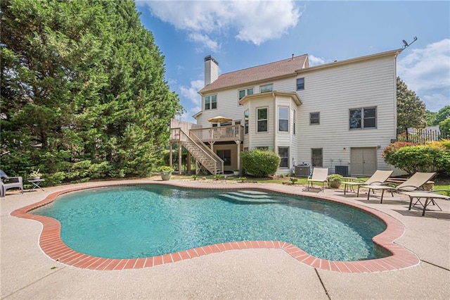 113 Gold Bridge Xing, Canton, GA 30114 - swimming pool featuring stairway, a patio area, a deck, and central AC unit