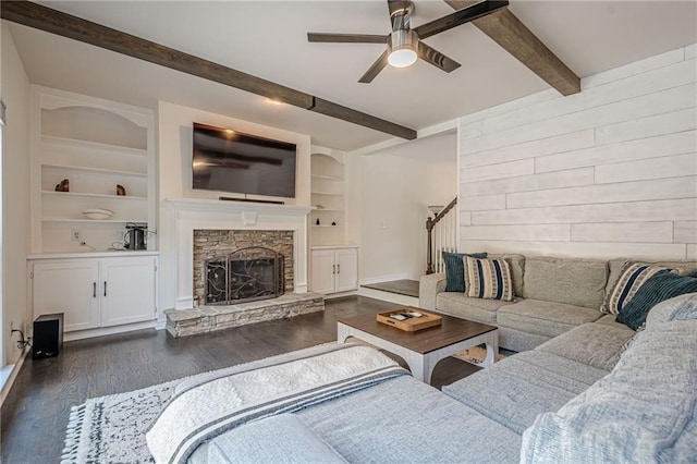 113 Gold Bridge Xing, Canton, GA 30114 - living room featuring ceiling fan, beam ceiling, dark wood-style flooring, stairs, and built in features