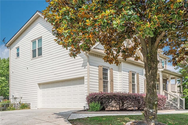 113 Gold Bridge Xing, Canton, GA 30114 - view of property exterior with driveway and a garage