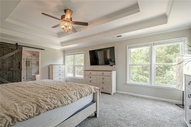 113 Gold Bridge Xing, Canton, GA 30114 - bedroom with a tray ceiling, a barn door, ornamental molding, light colored carpet, and baseboards