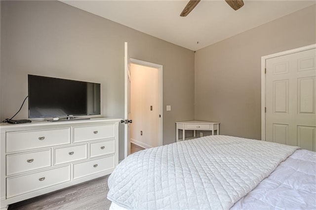 113 Gold Bridge Xing, Canton, GA 30114 - bedroom featuring wood finished floors, a ceiling fan, and baseboards