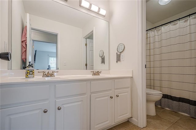 113 Gold Bridge Xing, Canton, GA 30114 - bathroom featuring toilet, double vanity, and tile patterned flooring