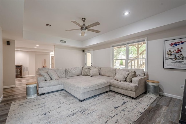 113 Gold Bridge Xing, Canton, GA 30114 - living area featuring wood finished floors, a ceiling fan, baseboards, a raised ceiling, and recessed lighting