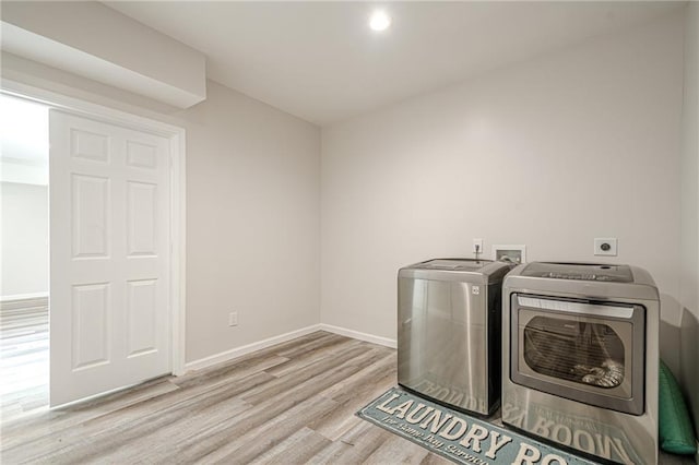 113 Gold Bridge Xing, Canton, GA 30114 - laundry room with separate washer and dryer, light wood finished floors, and baseboards