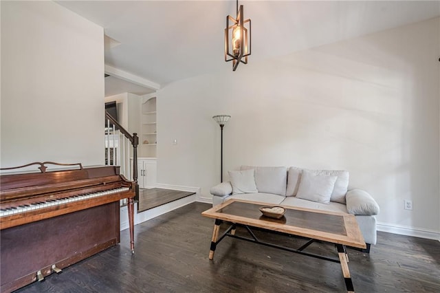 113 Gold Bridge Xing, Canton, GA 30114 - living room featuring wood finished floors, baseboards, built in shelves, and stairs