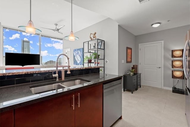 kitchen with pendant lighting, sink, dishwasher, and ceiling fan