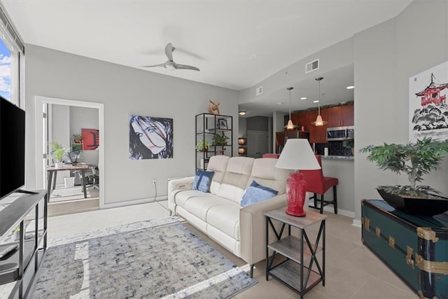 living room with ceiling fan