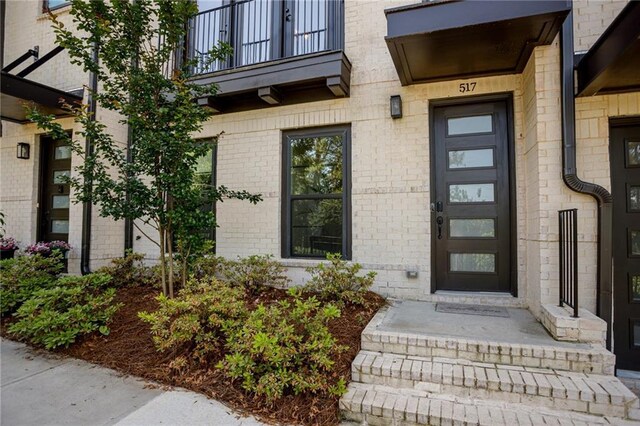 property entrance with a balcony