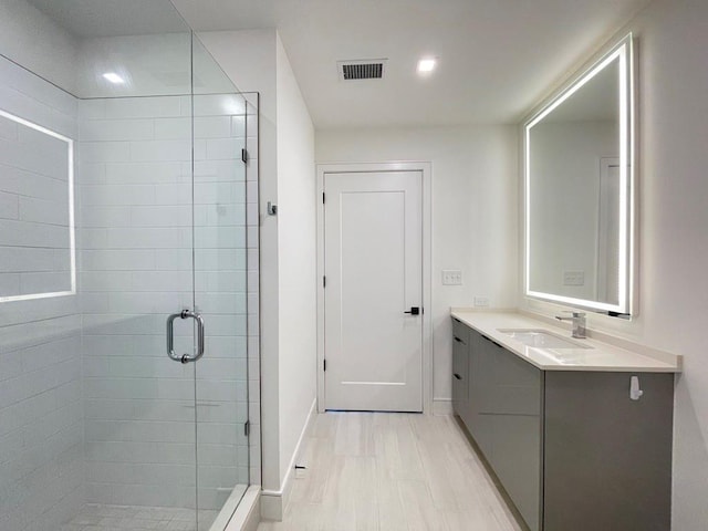 788 W Marietta St NW Unit 512, Atlanta, GA 30318 - bathroom featuring vanity and a stall shower