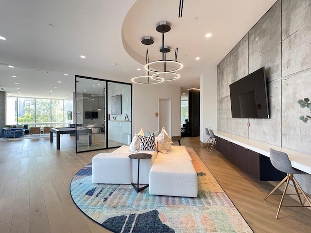 788 W Marietta St NW Unit 512, Atlanta, GA 30318 - living area with light wood-style flooring, recessed lighting, and a chandelier
