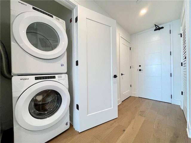 788 W Marietta St NW Unit 512, Atlanta, GA 30318 - laundry room with stacked washer and clothes dryer and light wood-style flooring