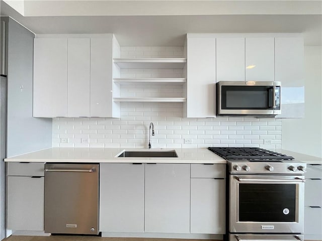 788 W Marietta St NW Unit 512, Atlanta, GA 30318 - kitchen featuring stainless steel appliances, open shelves, and modern cabinets