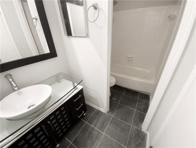 full bathroom with tile patterned flooring, vanity, toilet, and shower / tub combination