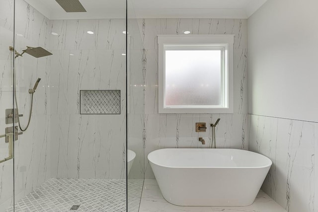full bathroom with marble finish floor, a soaking tub, and a marble finish shower