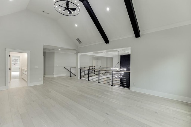 unfurnished living room with visible vents, recessed lighting, a chandelier, wood finished floors, and high vaulted ceiling