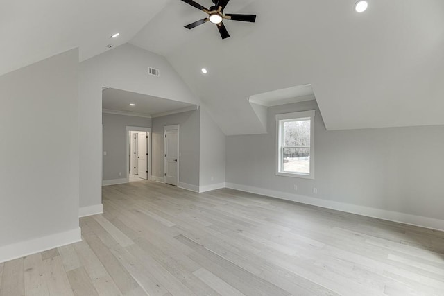 additional living space featuring recessed lighting, vaulted ceiling, visible vents, a ceiling fan, and baseboards