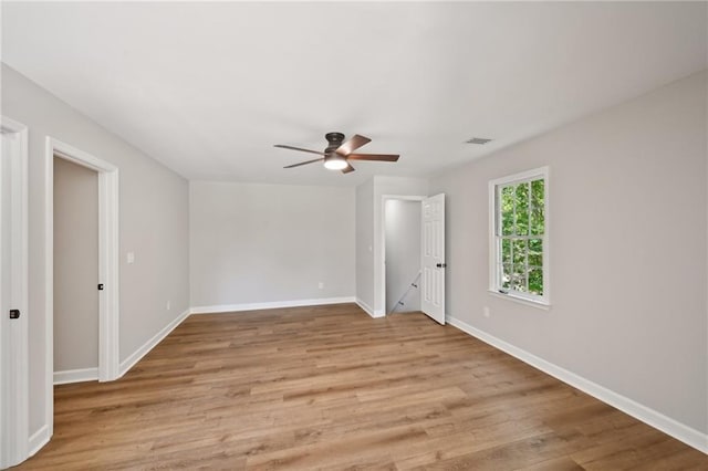 5702 Brynwood Cir NW, Acworth, GA 30101 - unfurnished room with a ceiling fan, baseboards, and light wood-style flooring